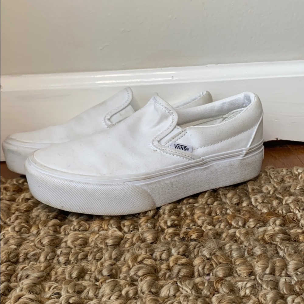 white platform slip on vans